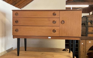A mid century teak veneered sideboard with three drawers, with...