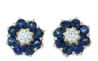 A pair of 18ct gold brilliant-cut diamond and sapphire cluster earrings.