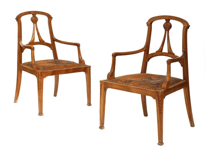 A pair of Art Nouveau walnut armchairs