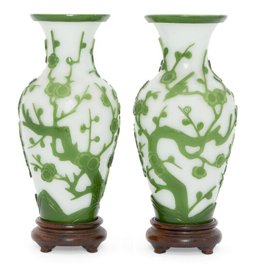 A pair of Chinese Peking green-overlay glass...