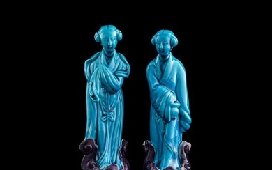 A pair of Chinese turquoise blue-glaze 'lady' figures, late 19th century