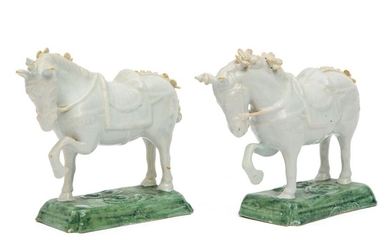 A pair of Delft pottery horse figures