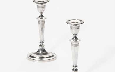 A pair of Dutch silver candlesticks Maker's mark...