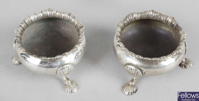 A pair of Edwardian silver cauldron salts, together with a cased modern silver condiment set.