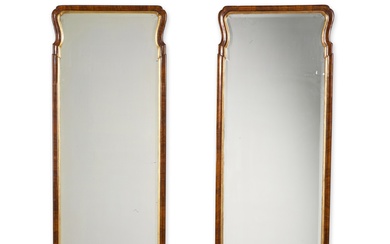 A pair of George I style walnut and parcel-gilt pier...
