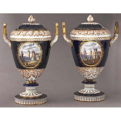 A pair of German cobalt ground porcelain vases and covers, ...