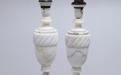 A pair of Italian marble table lamps.