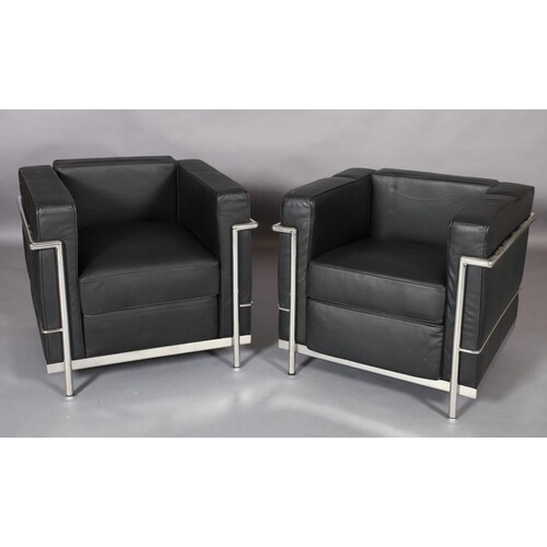 A pair of Le Corbusier LC2 style black leather and chrome fr...