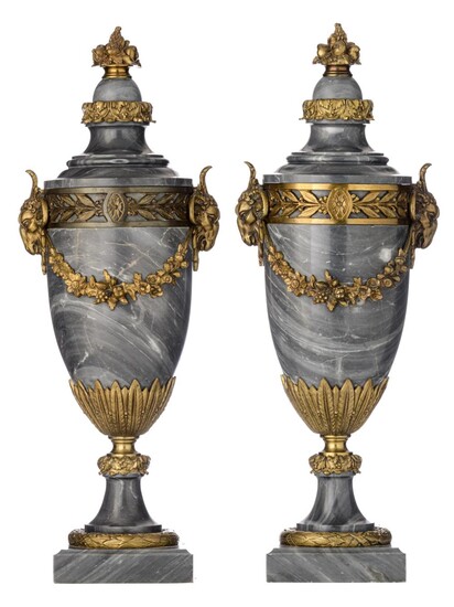 A pair of Neoclassical bleu Turquin marble cassolettes with gilt bronze mounts, H 55 cm