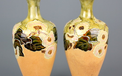 A pair of Royal Doulton stoneware vases, H. 27cm (one with small repair to foot).