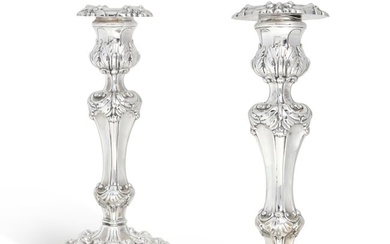 A pair of Victorian weighted silver candlesticks