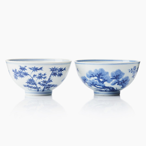 A pair of blue and white ‘Three Friends’ bowls