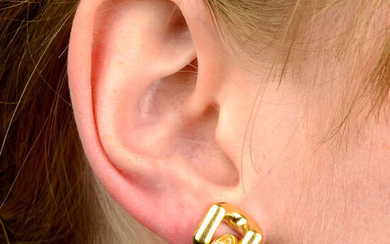 A pair of brilliant-cut diamond link earrings.