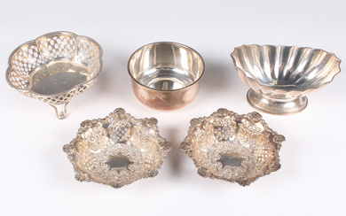 A pair of late Victorian silver circular lobed bonbon dishes, pierced and embossed with fruit beneat