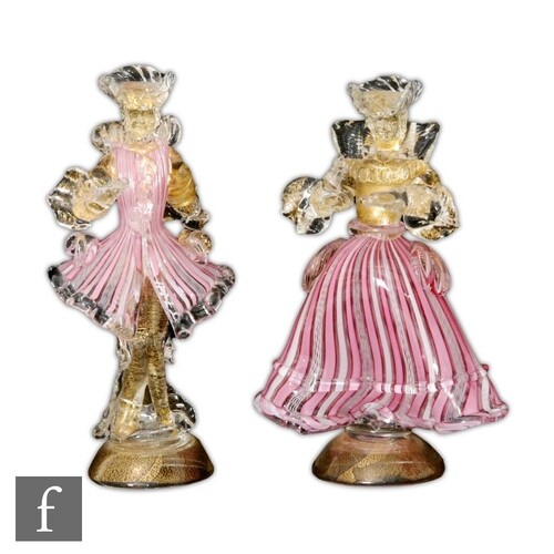 A pair of mid 20th Century Venetian Murano figures, in the m...