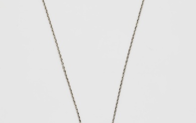A platinum and 14k gold black enamel diamond onyx and emerald Art Déco pendant necklace.
