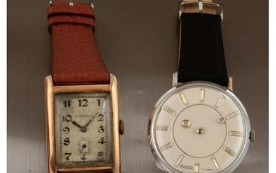 A set of 2 watches, 1 Longines Art Deco silver watch circa 1930 and 1 Taurus "Mysterious" metal watch circa 1950.
