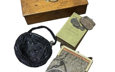A vintage wooden box containing a cut steel bead chatelaine...