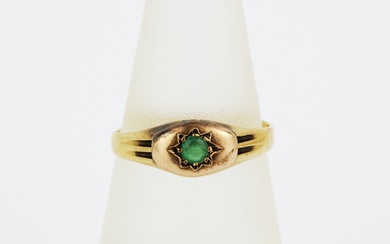 A yellow metal (tested minimum 9ct gold) ring set with an emerald, (L.5).