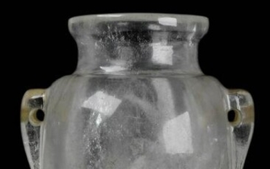 AN IMPORTANT AND RARE NEO-ASSYRIAN ROCK CRYSTAL VESSEL