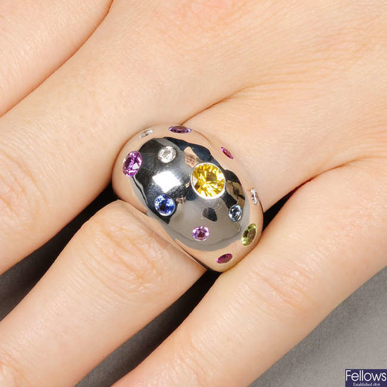 An 18ct gold diamond and gem-set bombe ring.Estimated