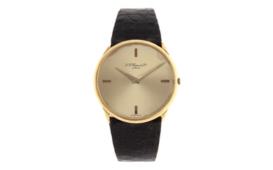An 18kt. gold wristwatch, L.U.C., Chopard, circa 1980. With manual movement, gold coloured dial, on original strap with clasp. Provenance: Sotheby's Amsterdam, 19 April 1999, lot 289. Diam. 40 mm. L. 25 cm. Total weight: 42.0 g.