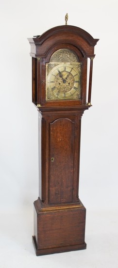 An 18th century oak cased eight day longcase clock, the dome...