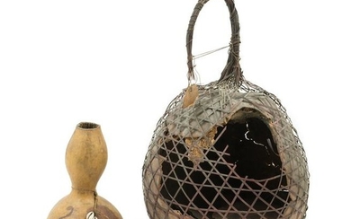 An African Gourd Basket Height 22 1/2 inches.