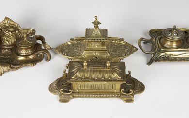 An Art Nouveau cast brass twin-handled inkstand, width 26.5cm, together with three other cast brass