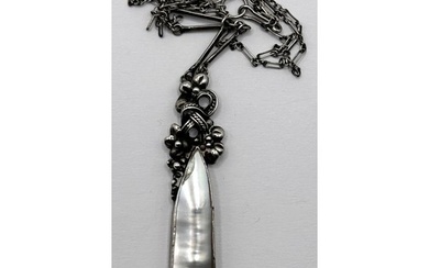 An Arts and Crafts silver coloured metal and shell necklace,...