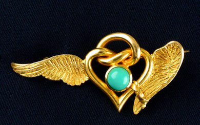 An Edwardian 15ct gold turquoise heart with lover's knot surmount and engraved wings, one wing tied to the heart by a ribbon.