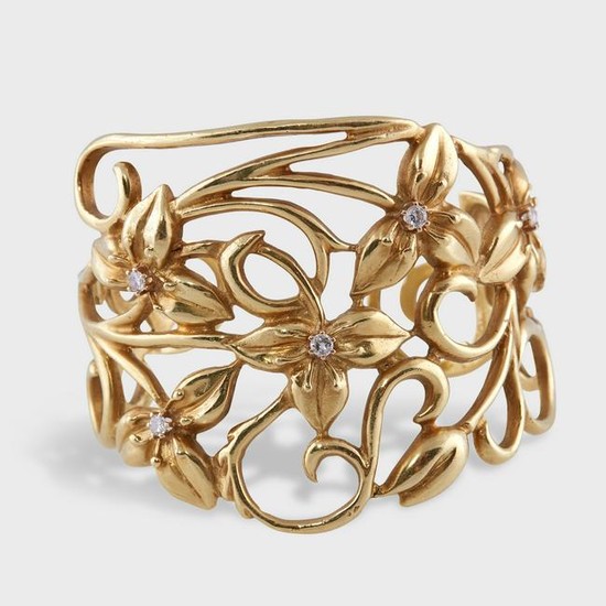 An eighteen karat gold and diamond cuff bracelet