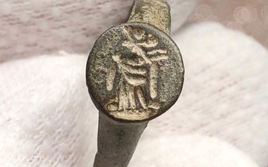 Ancient Roman Bronze Seal Ring engraved with Figure of Castor or Pollux (from Dioscuri Brothers) wearing Toga and Pileus