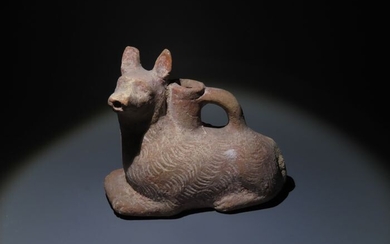 Ancient Roman Pottery Rare plastic vase in form of a dog or wolf. 13,5 cm H.