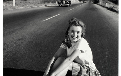 Andre de Dienes (Romanian/American, b.1913-d.1985): a silver gelatin print of a young Marilyn Monroe 'Life on the Road', 1945