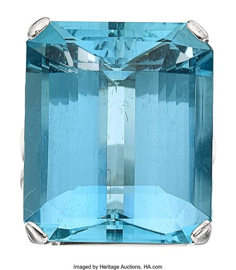 Aquamarine, White Gold Ring The ring features an emerald-cut...