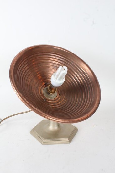 Art Deco copper table lamp, with ribbed copper shade raised on hexagonal cast metal base, 31cm