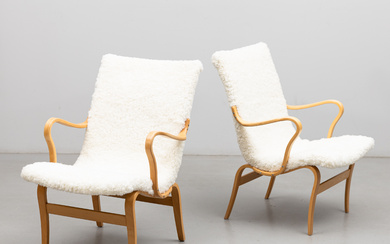 BRUNO MATHSSON. Armchairs, a pair, “Eva”, beech, sheepskin, branded Dux and Firma Karl Mathsson respectively.