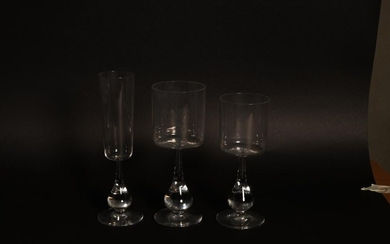 Baccarat. Crystal glass service with bulbous stem, stamped under the base, comprising