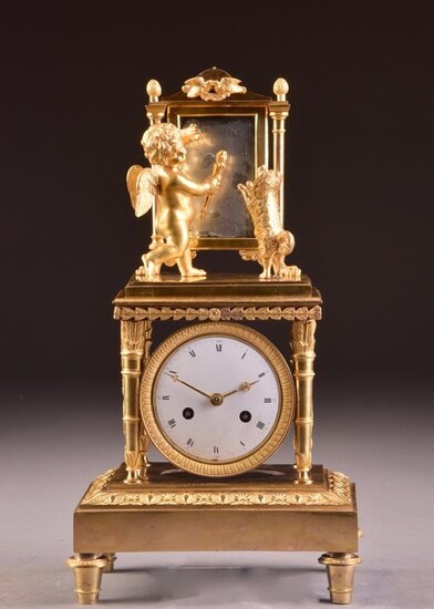 Beautiful French Empire ormolu mantel clock with Cupid in front of a mirror - Gilt bronze - Early 19th century
