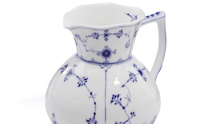 “Blue Fluted” porcelain milk pitcher decorated in blue. 387. Royal Copenhagen, 1898–1922....