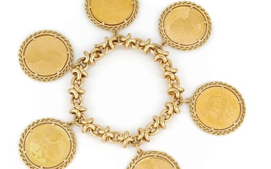 Bracelet en or jaune 18K avec médailles commémoratives en or 21K. Longueur 19 cm Poids...