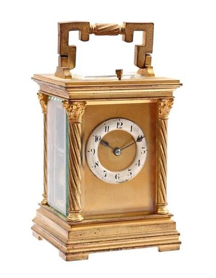 Brass travel alarm clock with 4 Corinthian columns and