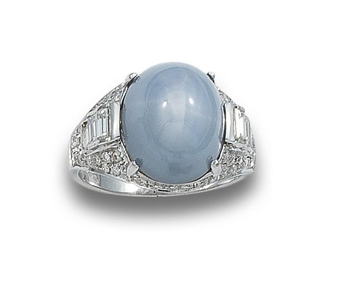 CABOCHON RING IN STAR SAPPHIRE, DIAMONDS AND WHITE GOLD