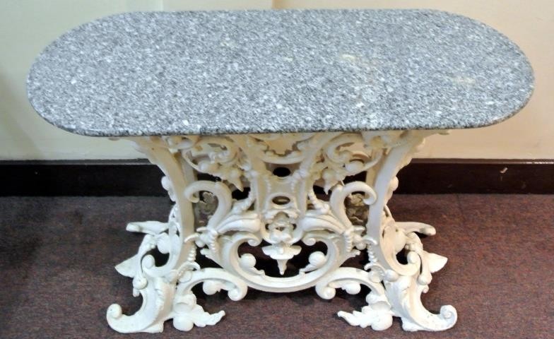Cast iron garden or patio table with oval marble top, ornate...