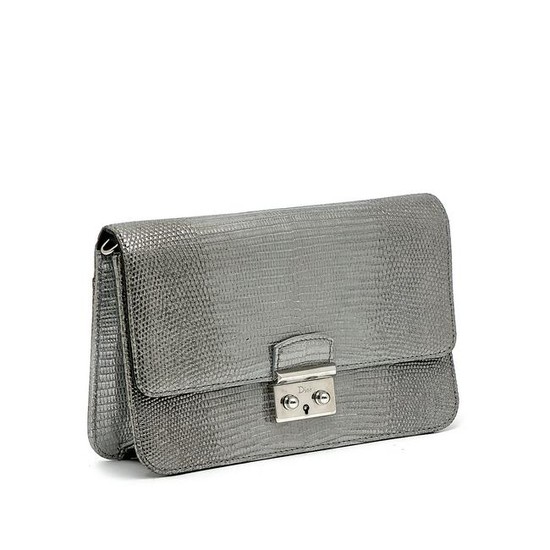 Christian Dior - a silver embossed leather handbag.