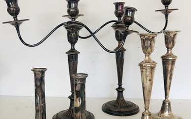 NOT SOLD. Collection of three pairs of English silver plated candlesticks. 19th-20th century. H. 20-40...