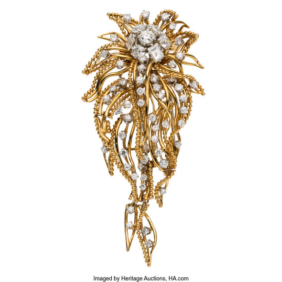 Diamond, Gold Brooch The brooch features European and transitional-cut...