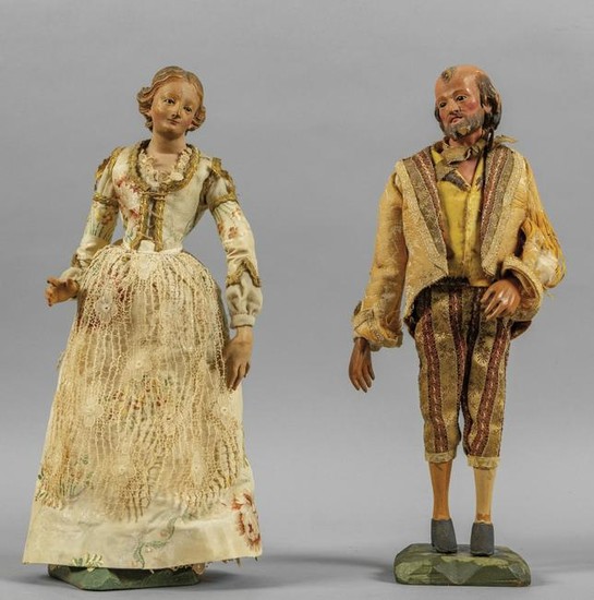 Due statuine da presepe in legno policromo con