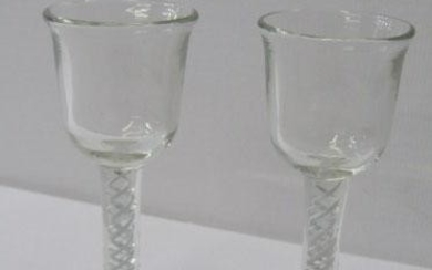 EARLY GLASSWARE, pair of opaque cotton twist stem liquor...